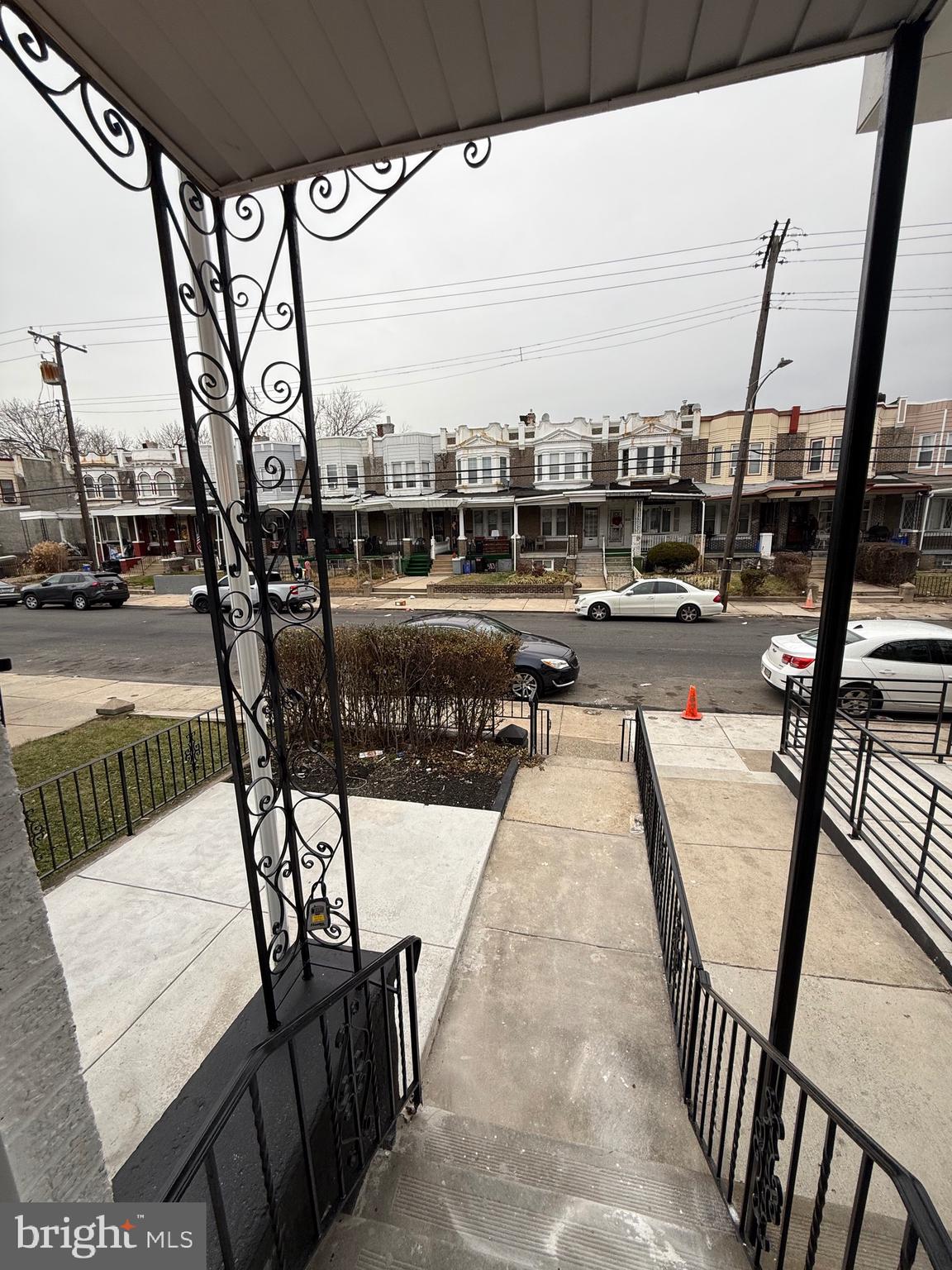 5908 Christian Street Philadelphia, PA 19143 - Photo 33 of 41 a view of swimming pool with outdoor seating and city view