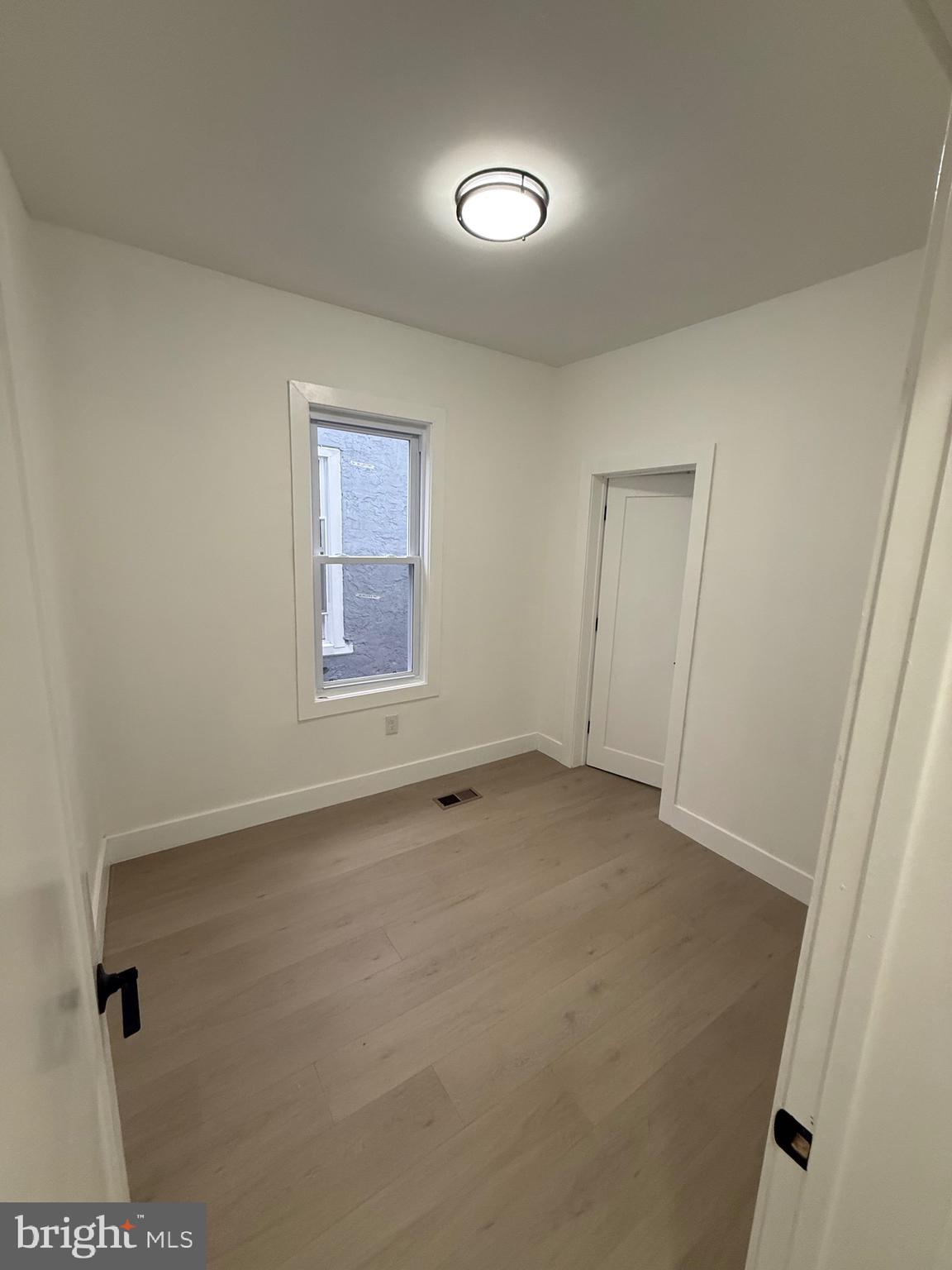 5908 Christian Street Philadelphia, PA 19143 - Photo 37 of 41 an empty room with windows