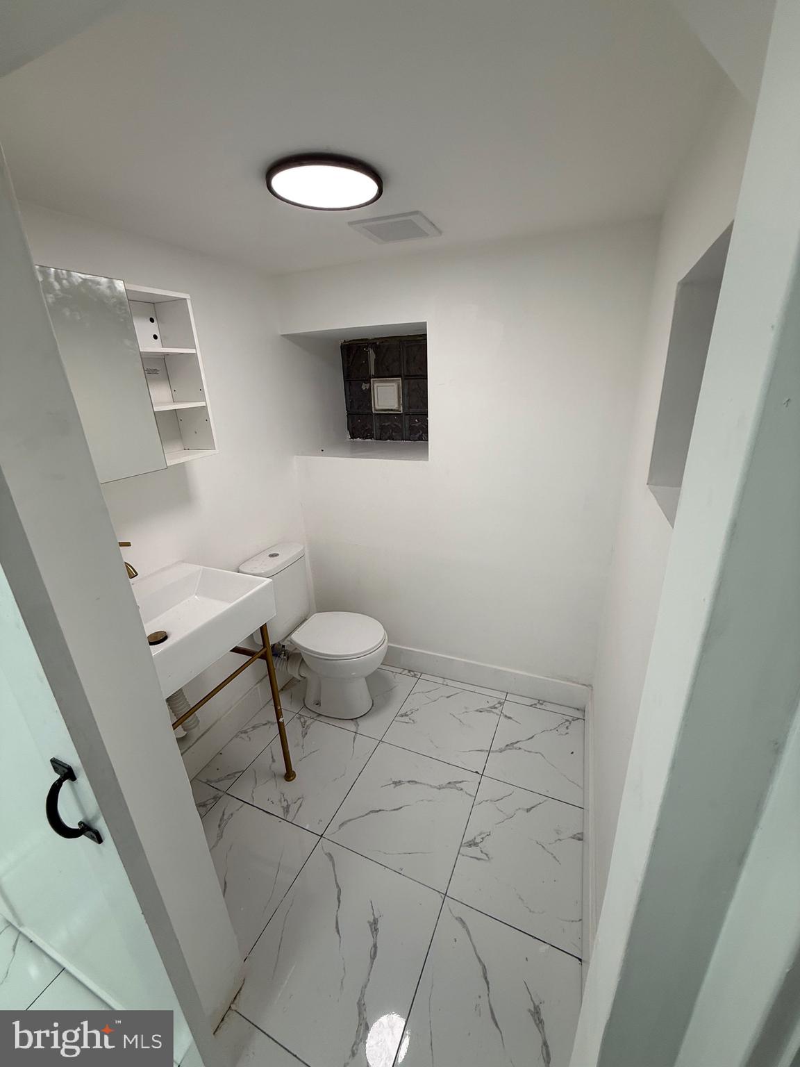 5908 Christian Street Philadelphia, PA 19143 - Photo 39 of 41 a bathroom with a toilet