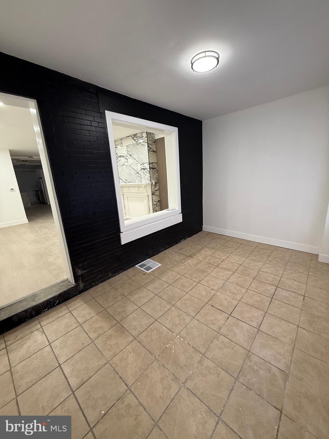 5908 Christian Street Philadelphia, PA 19143 - Photo 7 of 41 a view of an empty room and window