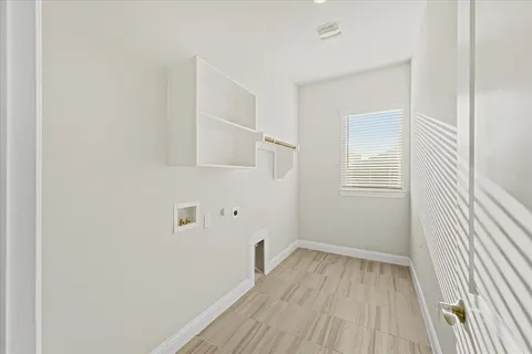 a view of a room with wooden floor and small space