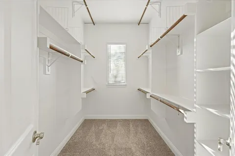 a view of hallway with stairs