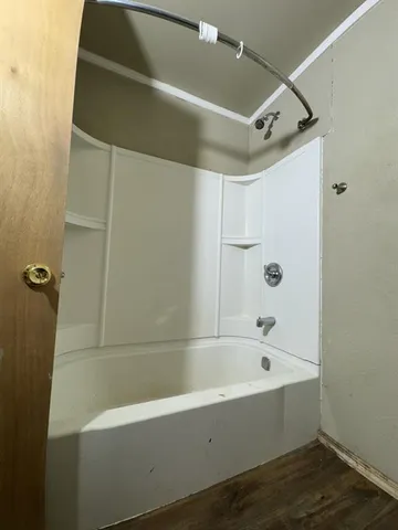a bathroom with a bathtub