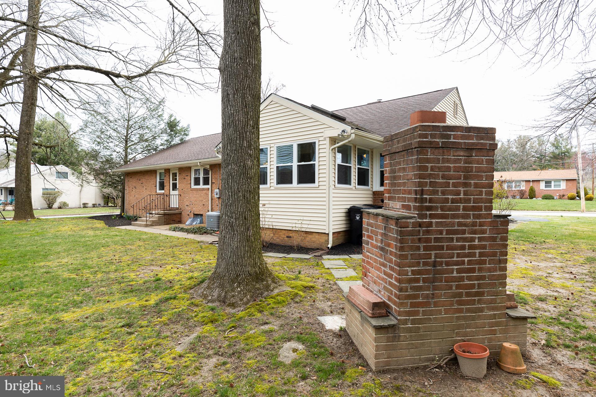 4500 Fielding Road Wilmington, DE 19802 - Photo 22 of 22 Exterior back with brick fireplace
