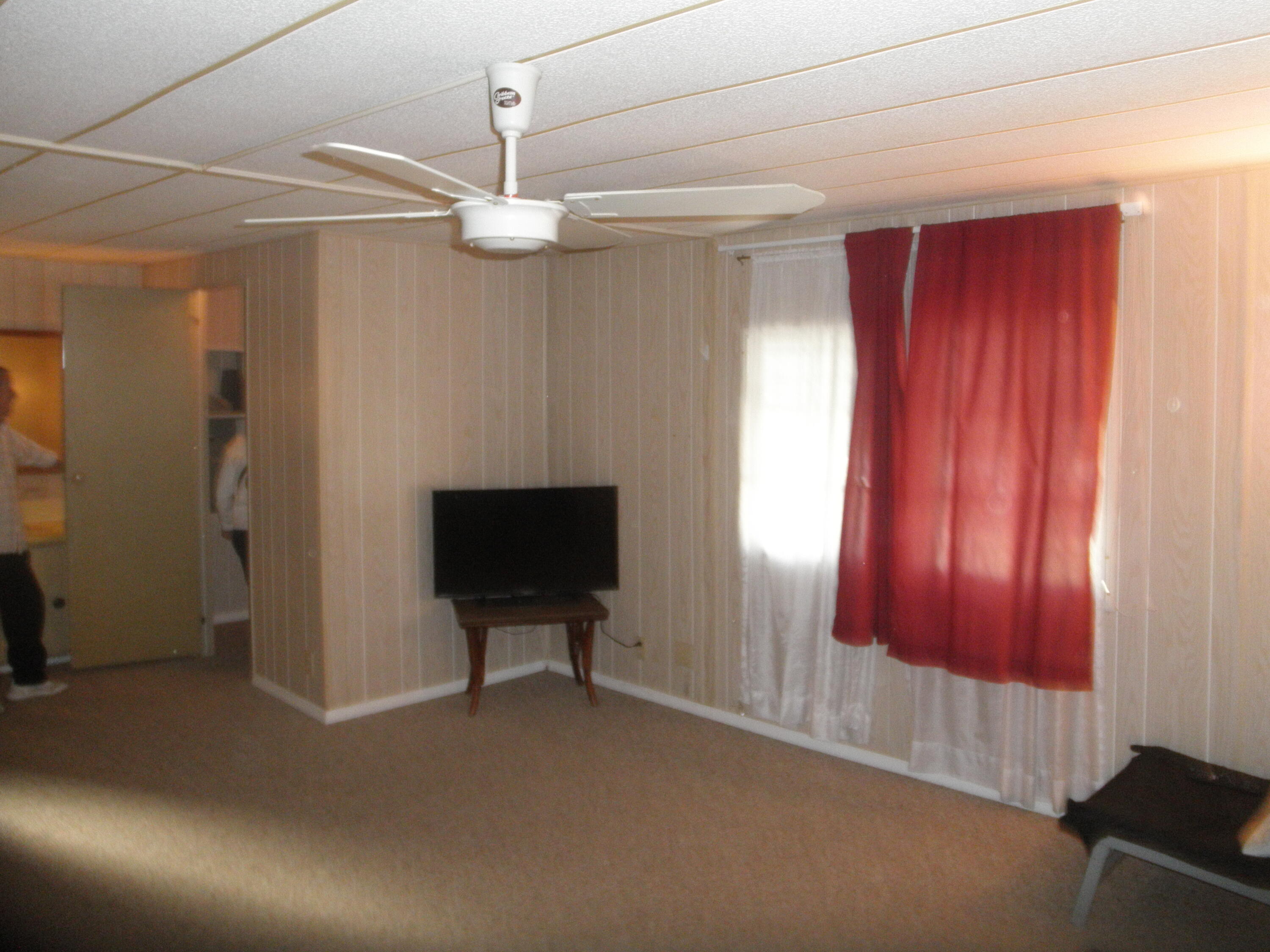4544 Sunset Ranch Road West Palm Beach, FL 33415 - Photo 3 of 10 a view of an empty room with a window