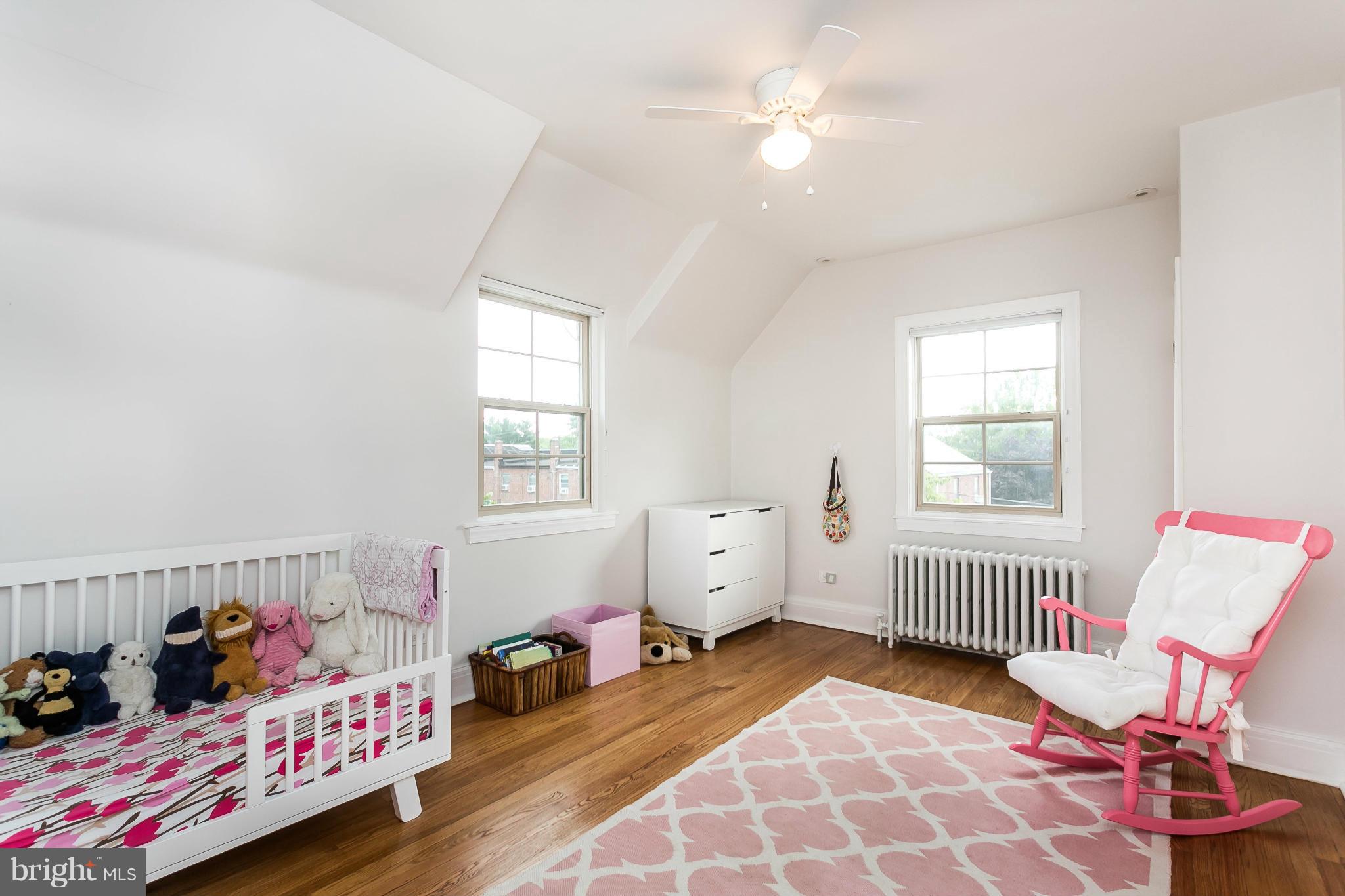 3713 Rexmere Road Baltimore, MD 21218 - Photo 22 of 30 a bedroom with furniture and a window