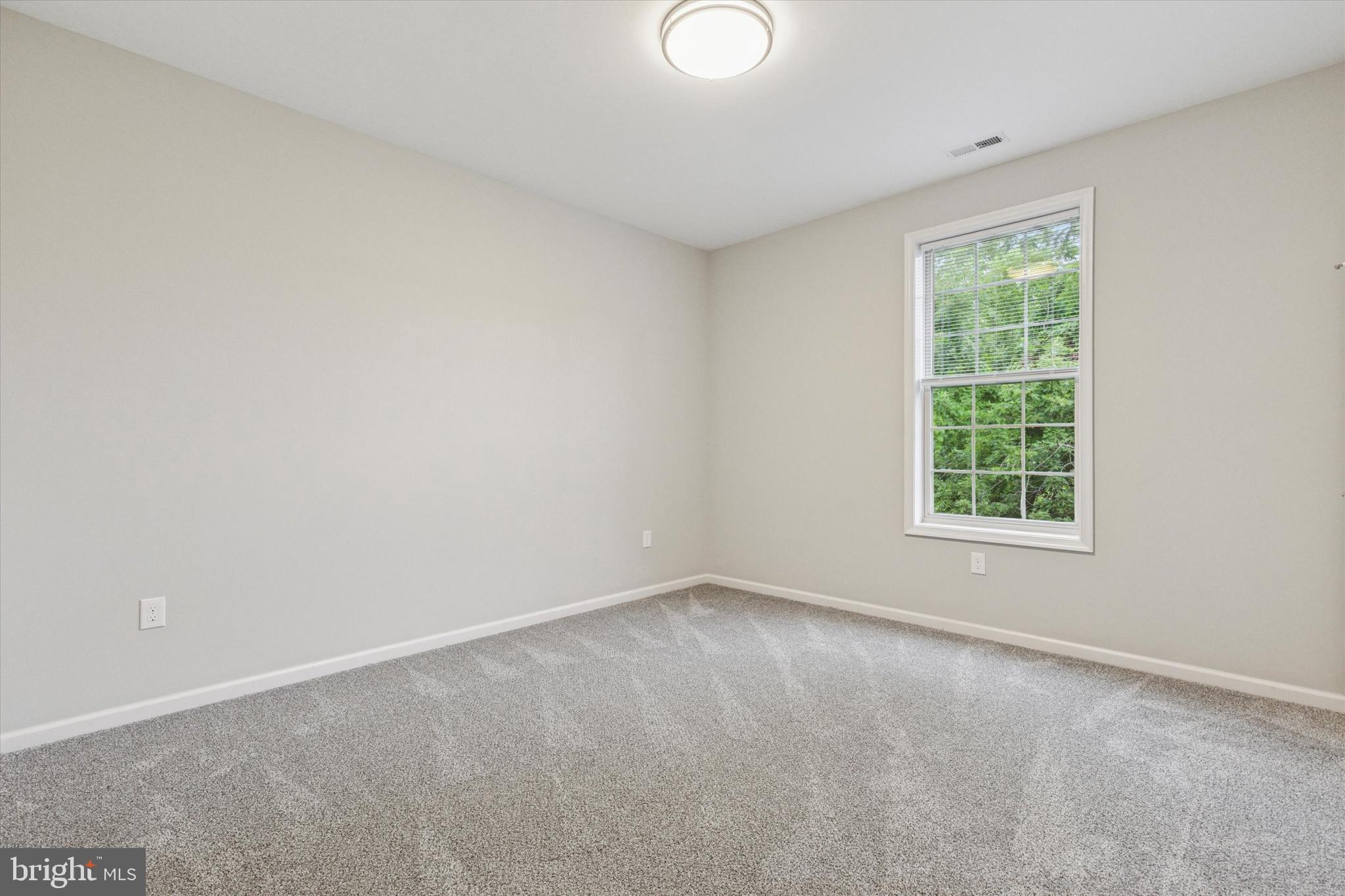 3238 Ridge Pike, Unit A Eagleville, PA 19403 - Photo 6 of 14 a view of a big room with windows