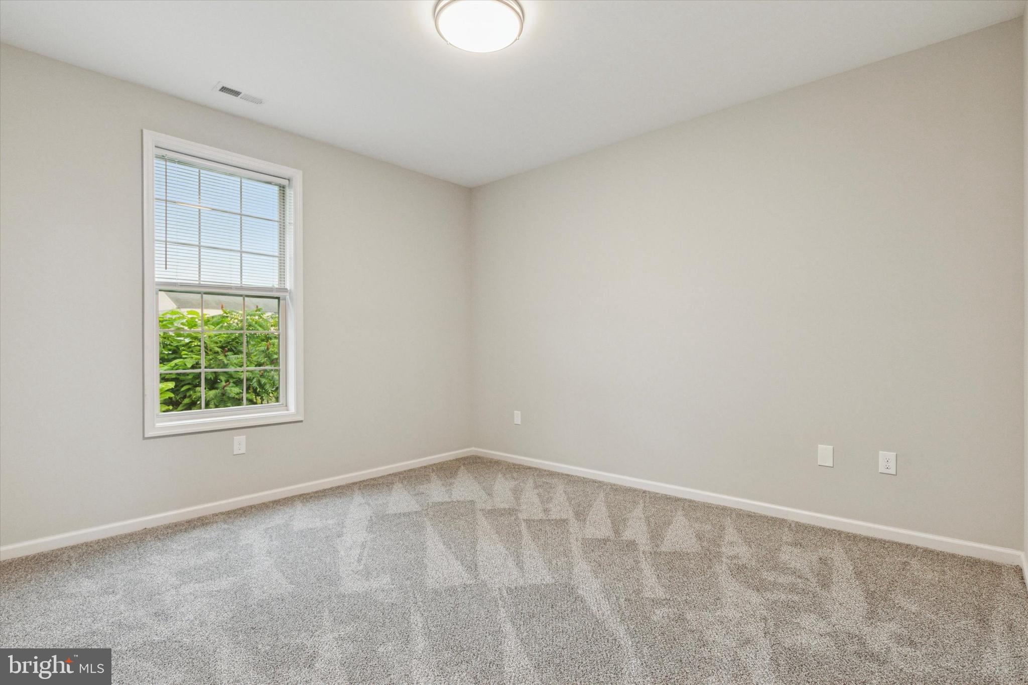 3238 Ridge Pike, Unit A Eagleville, PA 19403 - Photo 9 of 14 an empty room with a window