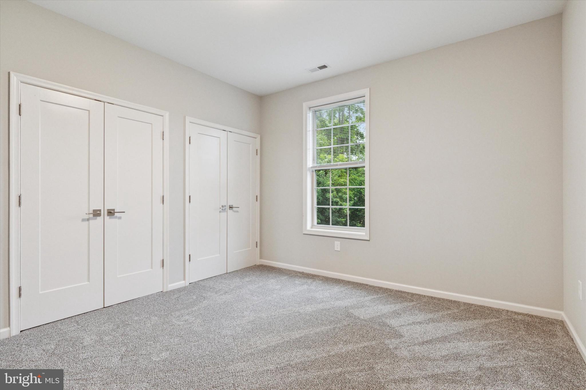 3238 Ridge Pike, Unit A Eagleville, PA 19403 - Photo 10 of 14 a view of an empty room with a window
