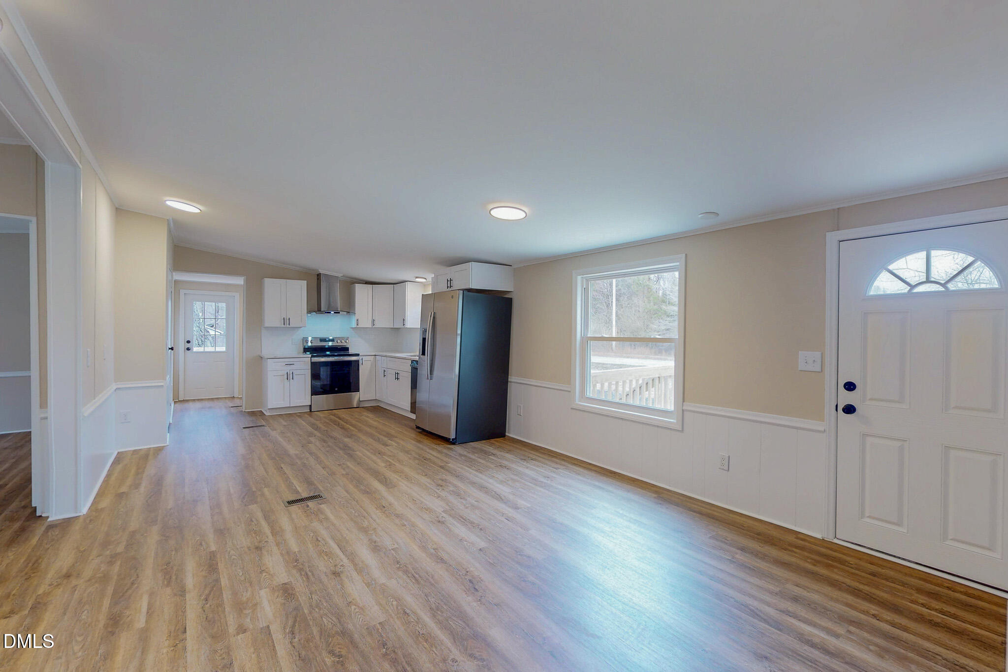 67 Halifax Road Roxboro, NC 27574 - Photo 39 of 48 a view of kitchen with wooden floor electronic appliances and window