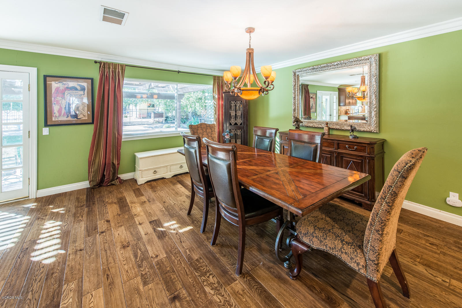 1610 Rambling Road Simi Valley, CA 93065 - Photo 12 of 26 a view of a dining room with furniture window and wooden floor