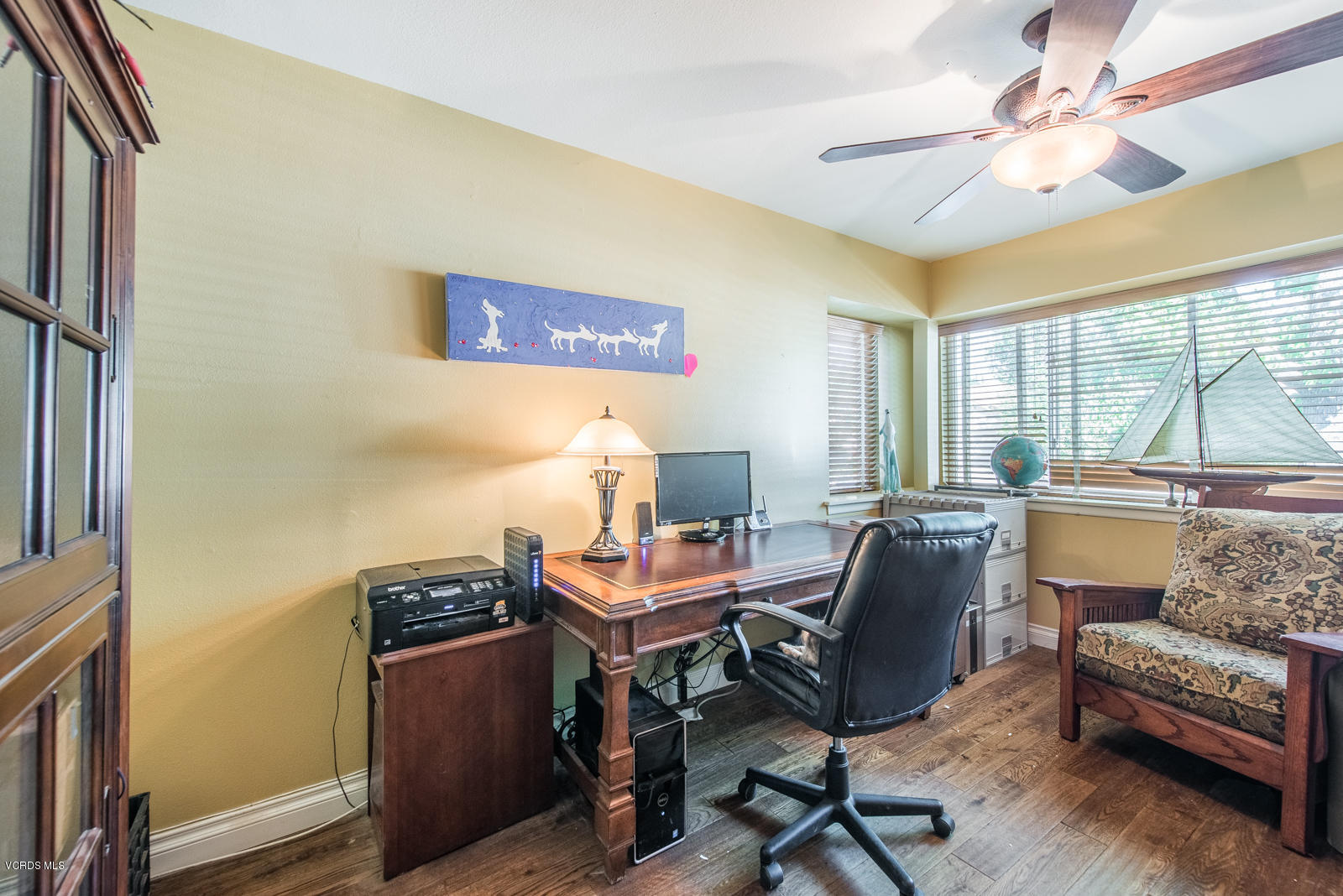 1610 Rambling Road Simi Valley, CA 93065 - Photo 18 of 26 a view of a workspace with furniture and a window