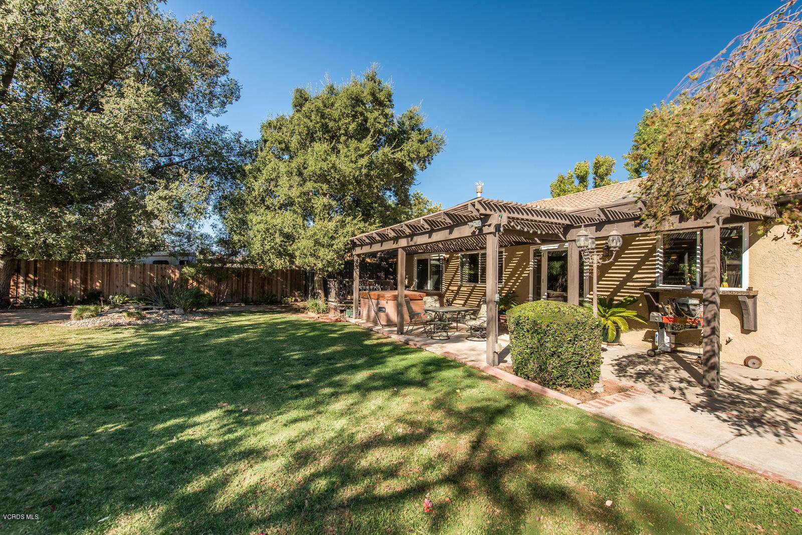 1610 Rambling Road Simi Valley, CA 93065 - Photo 19 of 26 a front view of a house with a yard