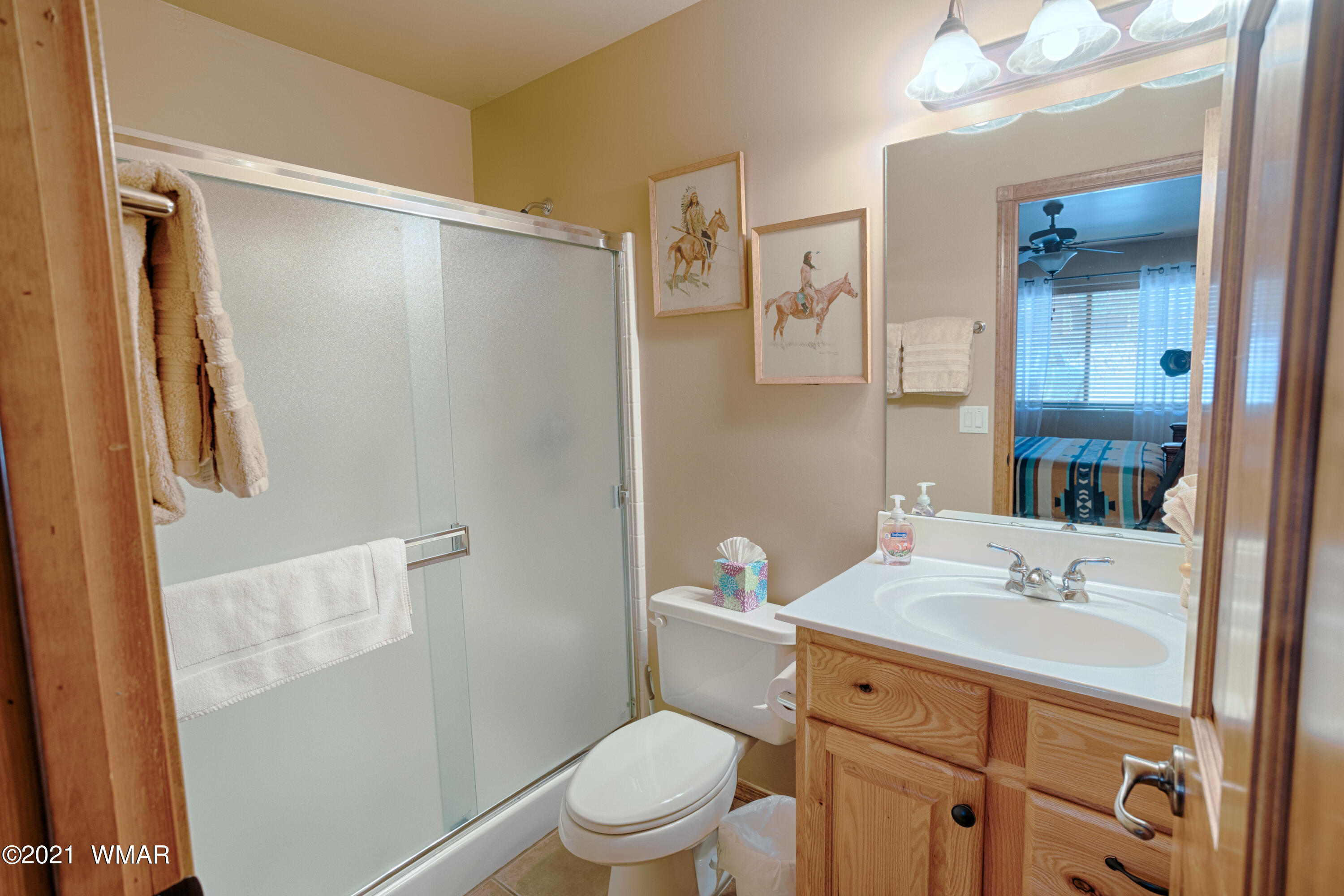 4861 West Cottage Loop Show Low, AZ 85901 - Photo 8 of 35 a bathroom with a granite countertop sink toilet and shower