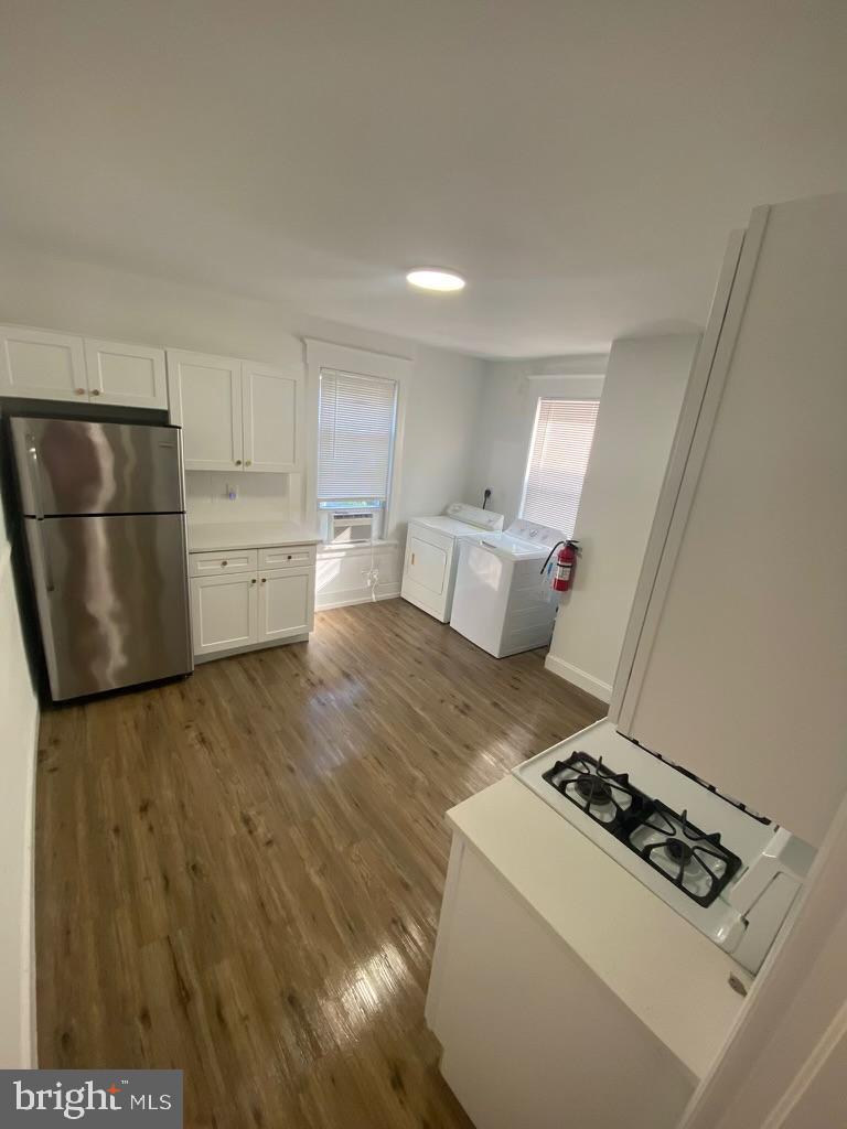 102 Chestnut Street Audubon, NJ 08106 - Photo 3 of 15 a kitchen with a stove and a refrigerator