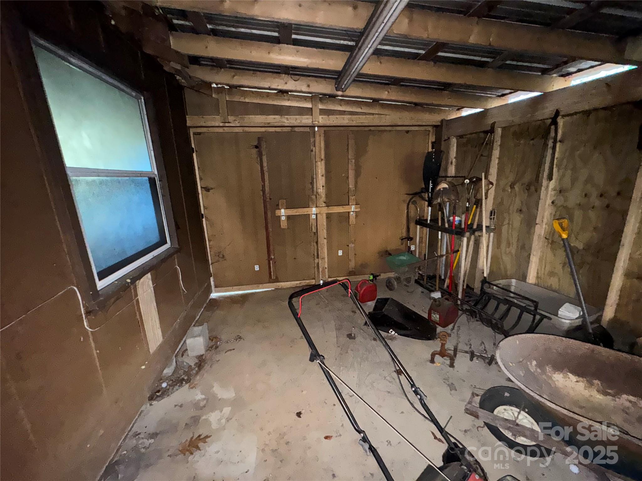 269 East View Road Sylva, NC 28779 - Photo 25 of 28 a room with furniture and a mirror