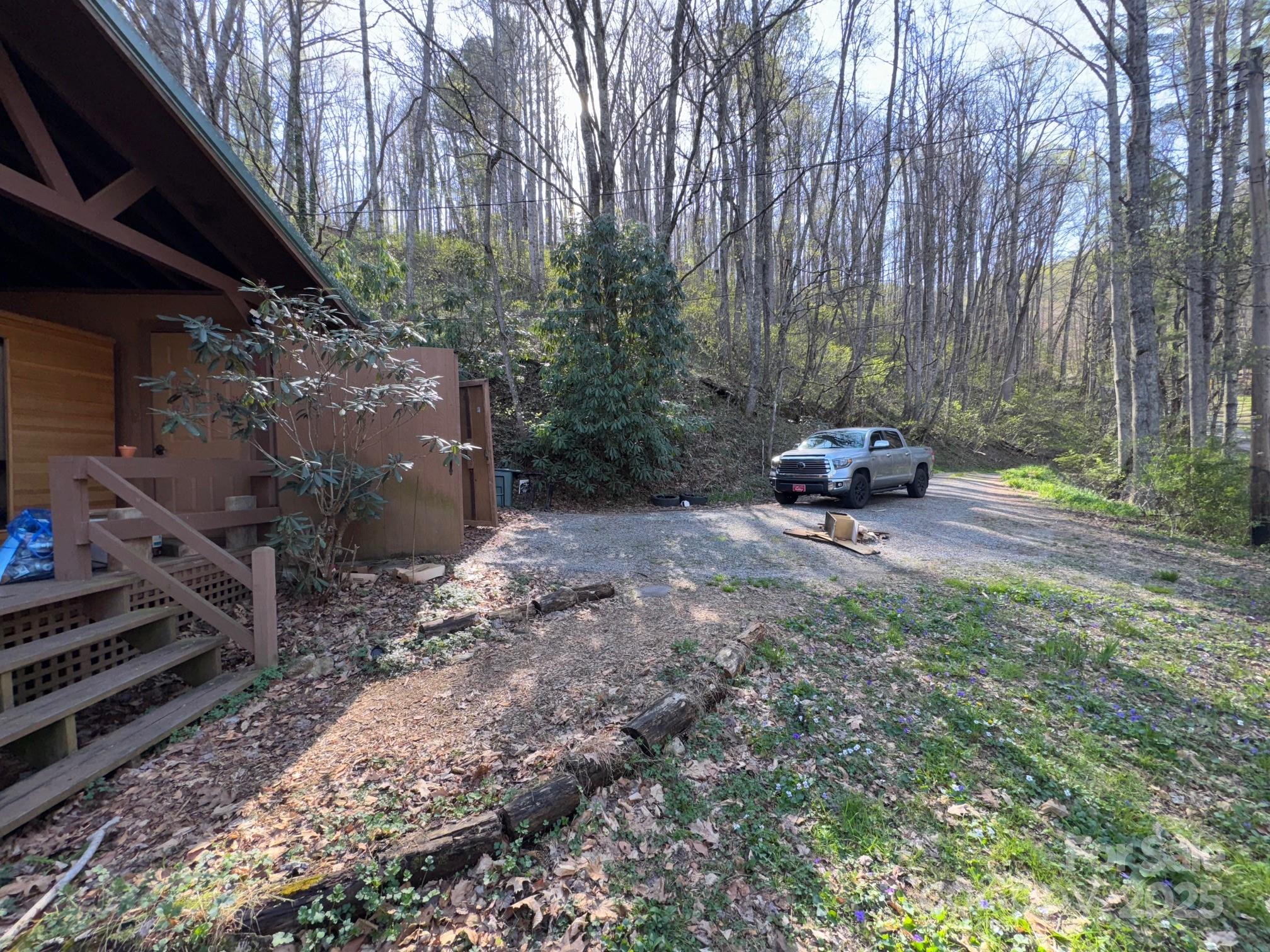 269 East View Road Sylva, NC 28779 - Photo 28 of 28 a backyard of a house with outdoor seating