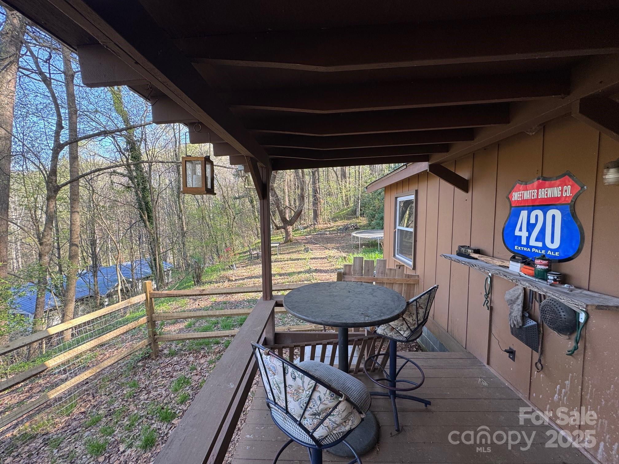 269 East View Road Sylva, NC 28779 - Photo 4 of 28 a view of a porch with furniture and a yard