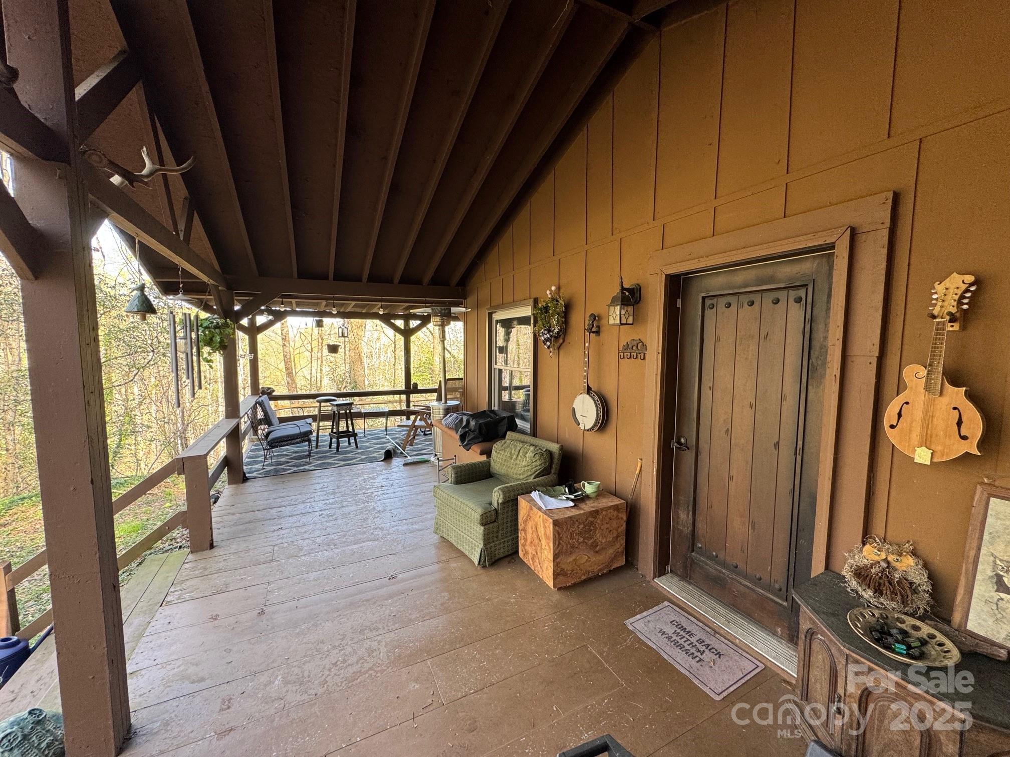 269 East View Road Sylva, NC 28779 - Photo 7 of 28 a view of a livingroom with furniture and floor to ceiling window