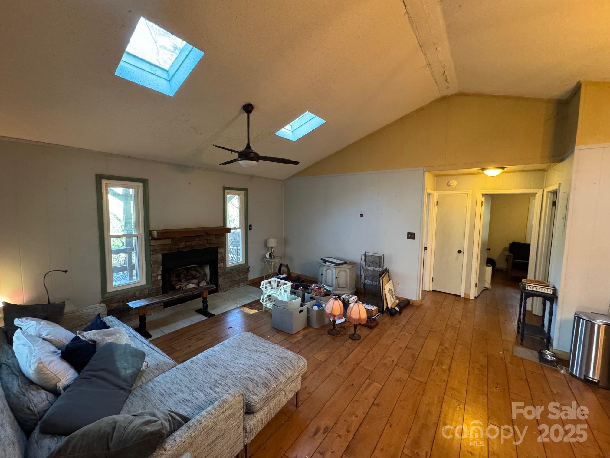 269 East View Road Sylva, NC 28779 - Photo 9 of 28 a living room with furniture and a fireplace