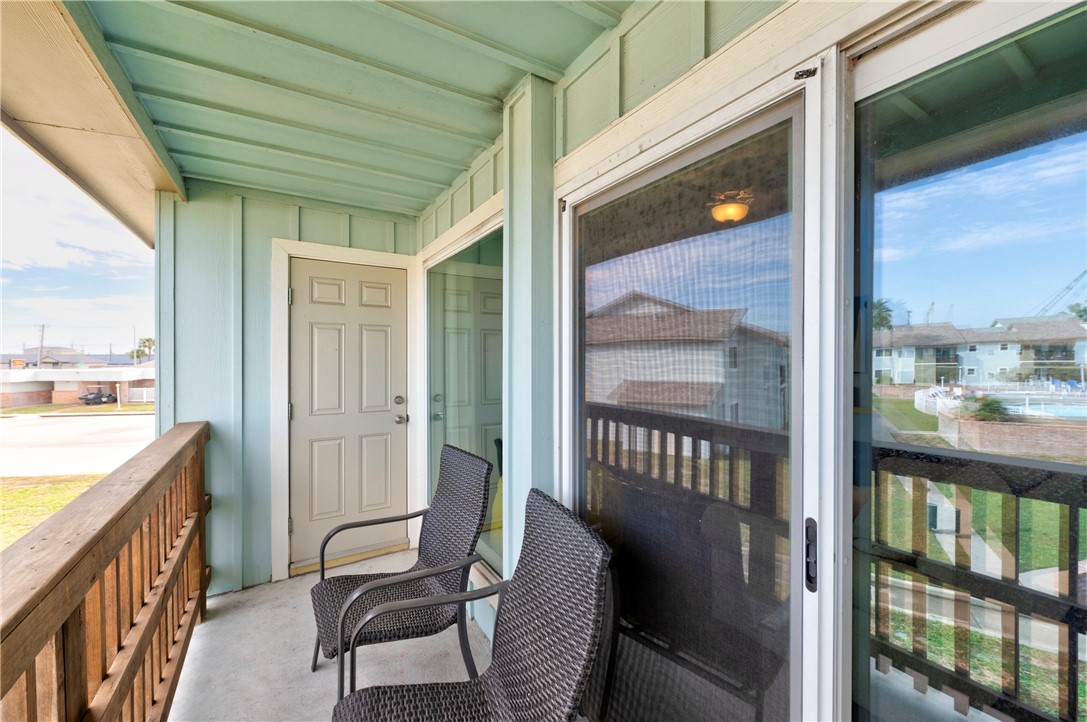 230 Cut-Off Road, Unit 204 Port Aransas, TX 78373 - Photo 25 of 37 a view of a chairs in the balcony