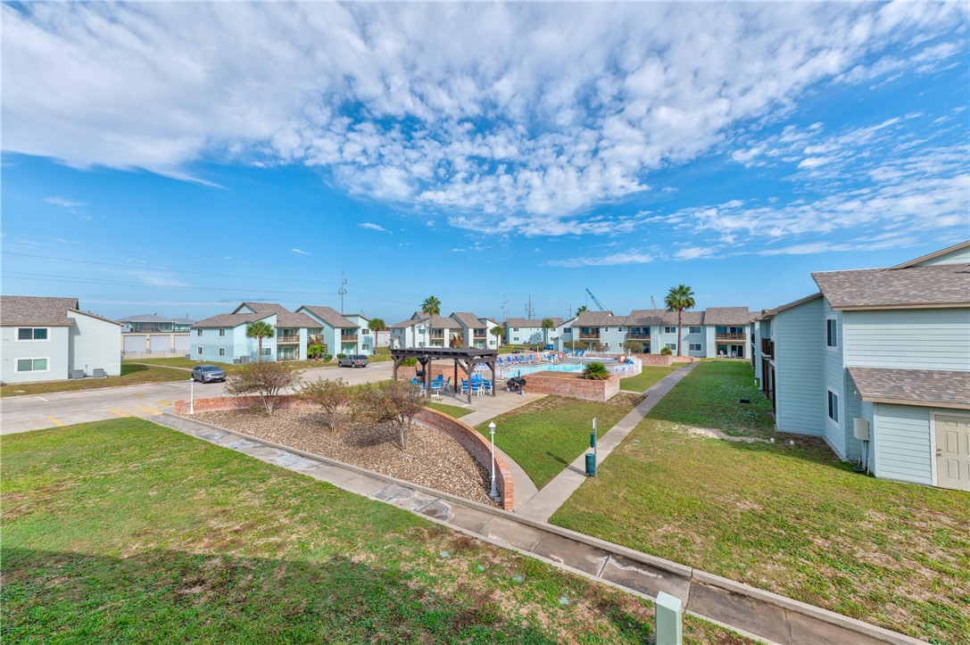230 Cut-Off Road, Unit 204 Port Aransas, TX 78373 - Photo 26 of 37 a view of a backyard
