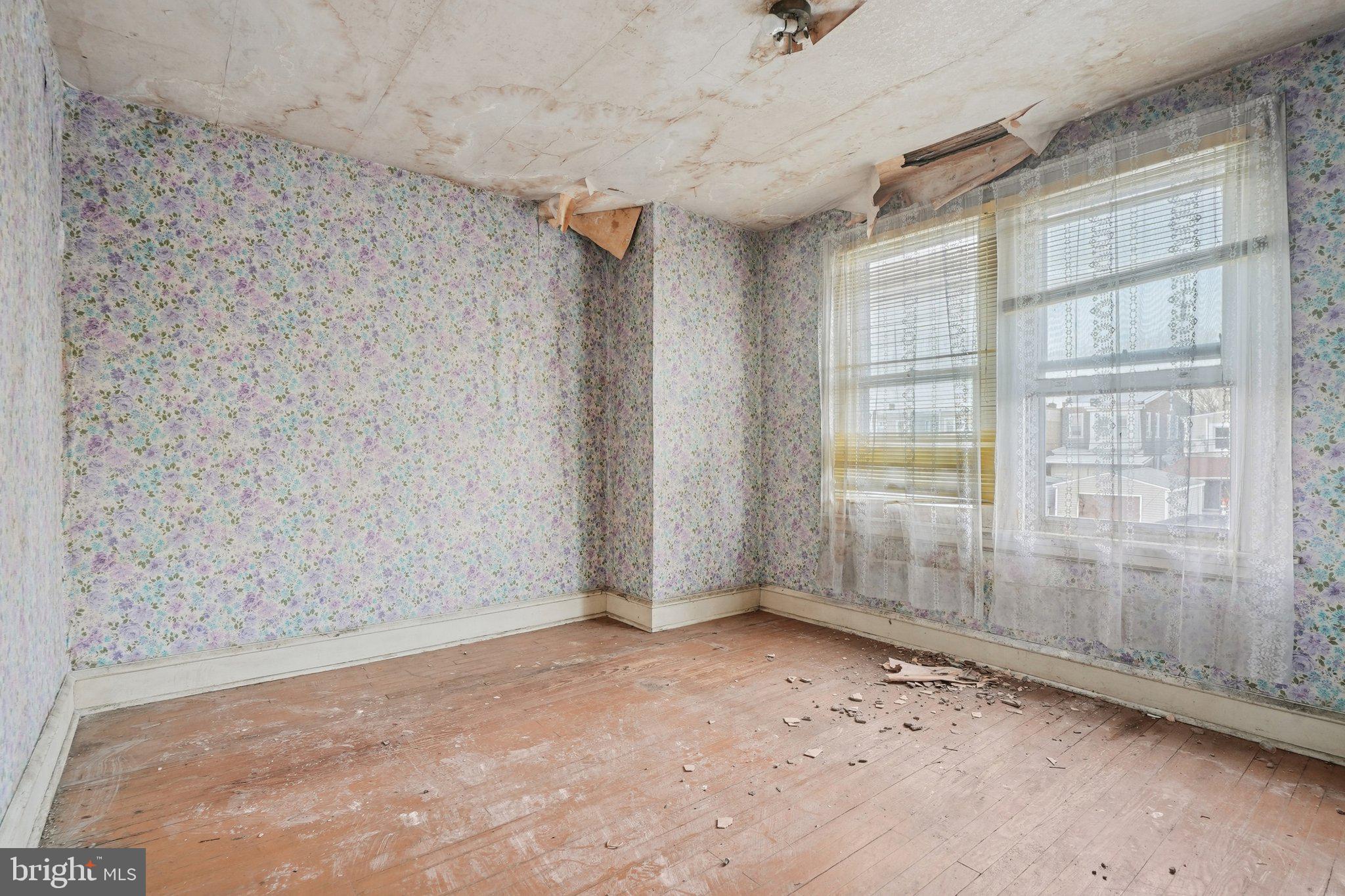 5322 James Street Philadelphia, PA 19137 - Photo 18 of 40 an empty room with a empty space and windows