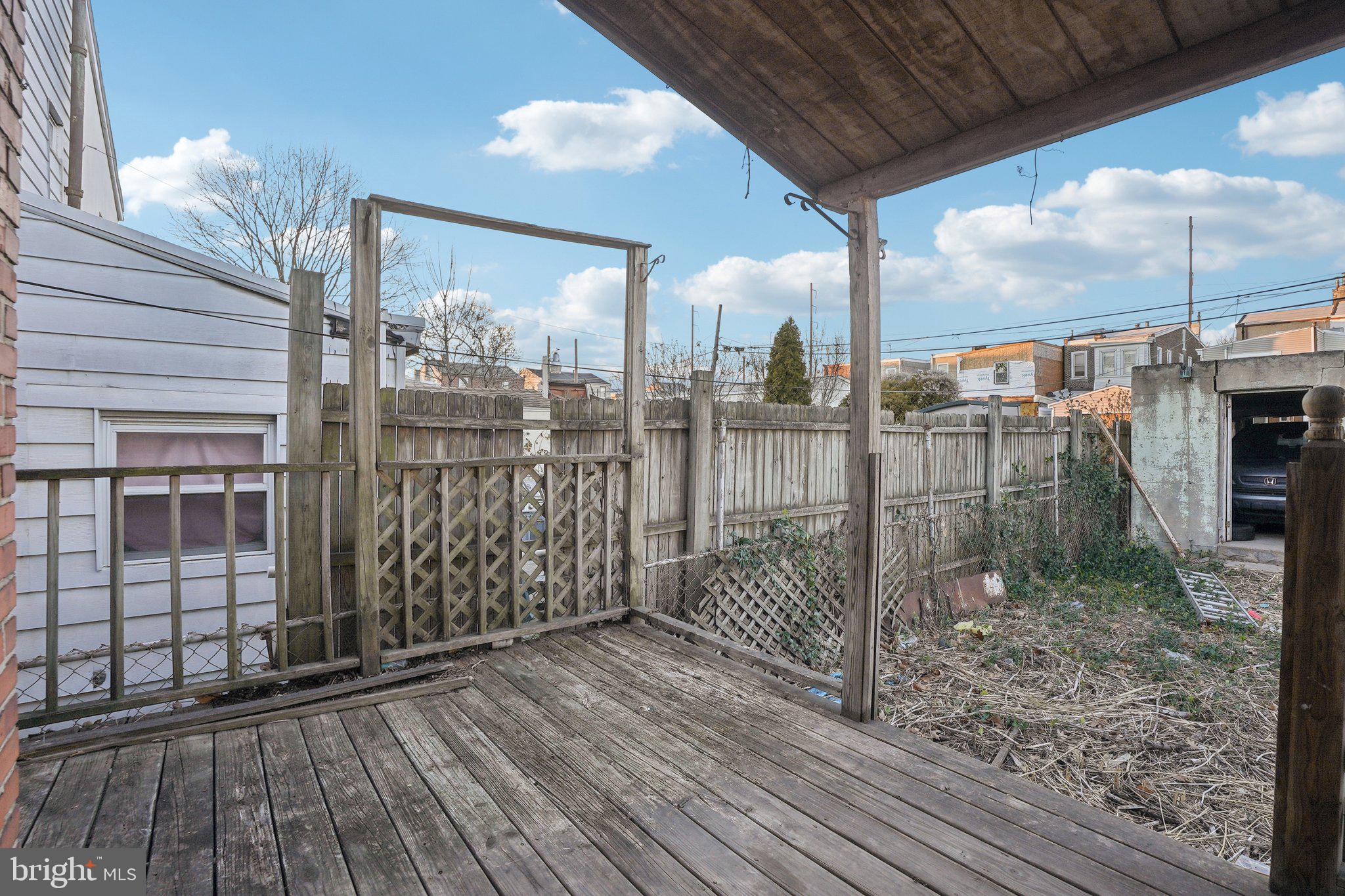 5322 James Street Philadelphia, PA 19137 - Photo 30 of 40 a view of a balcony with floor to ceiling window wooden floor