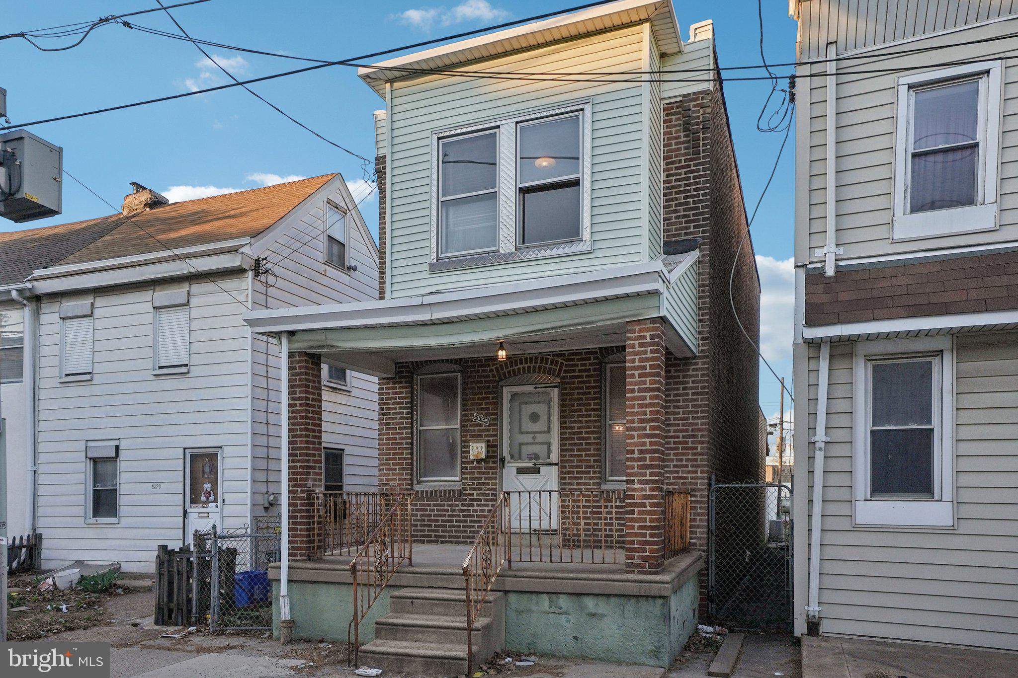 5322 James Street Philadelphia, PA 19137 - Photo 3 of 40 a view of brick house with large windows