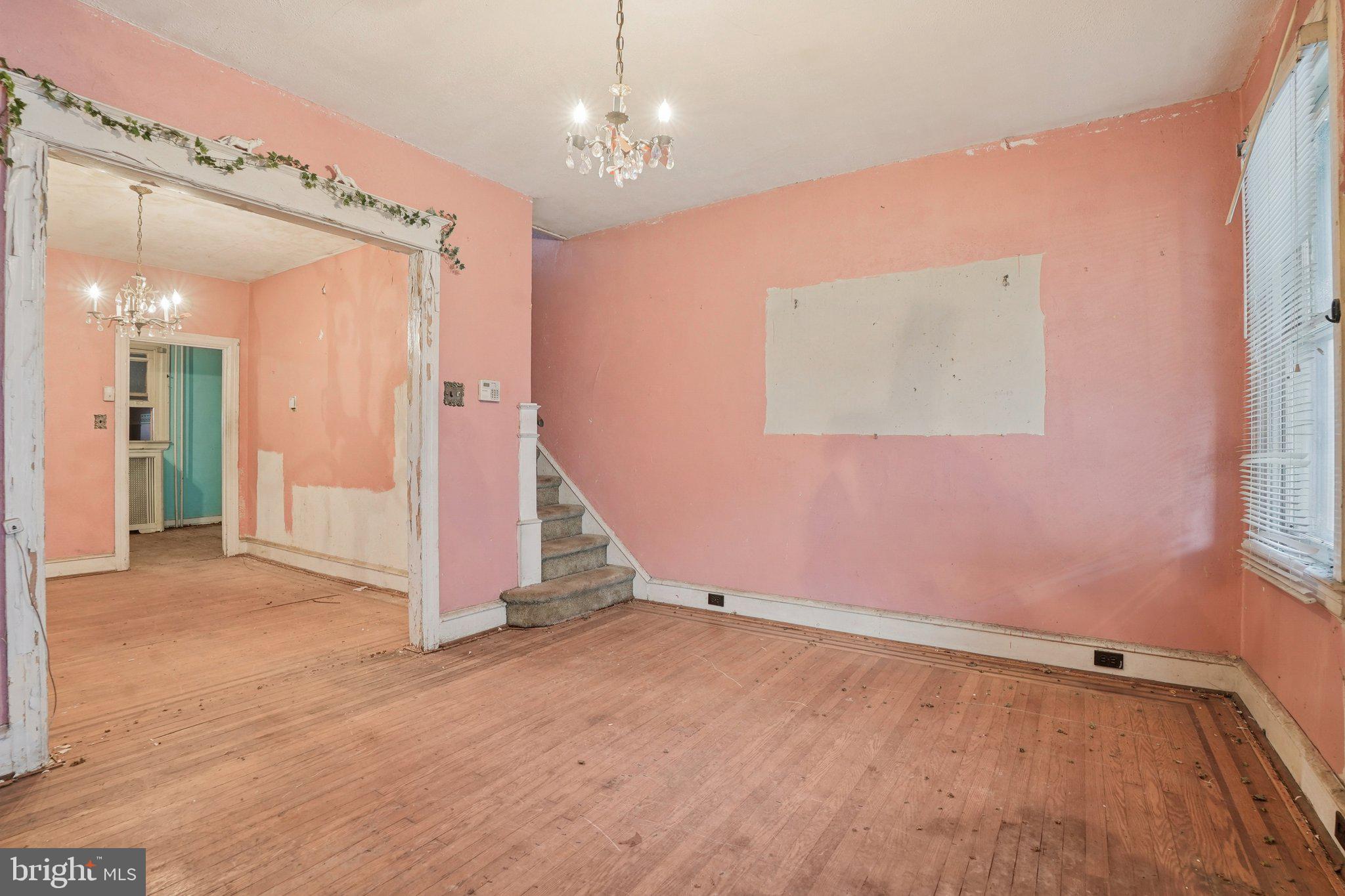5322 James Street Philadelphia, PA 19137 - Photo 5 of 40 wooden floor in an empty room with a window