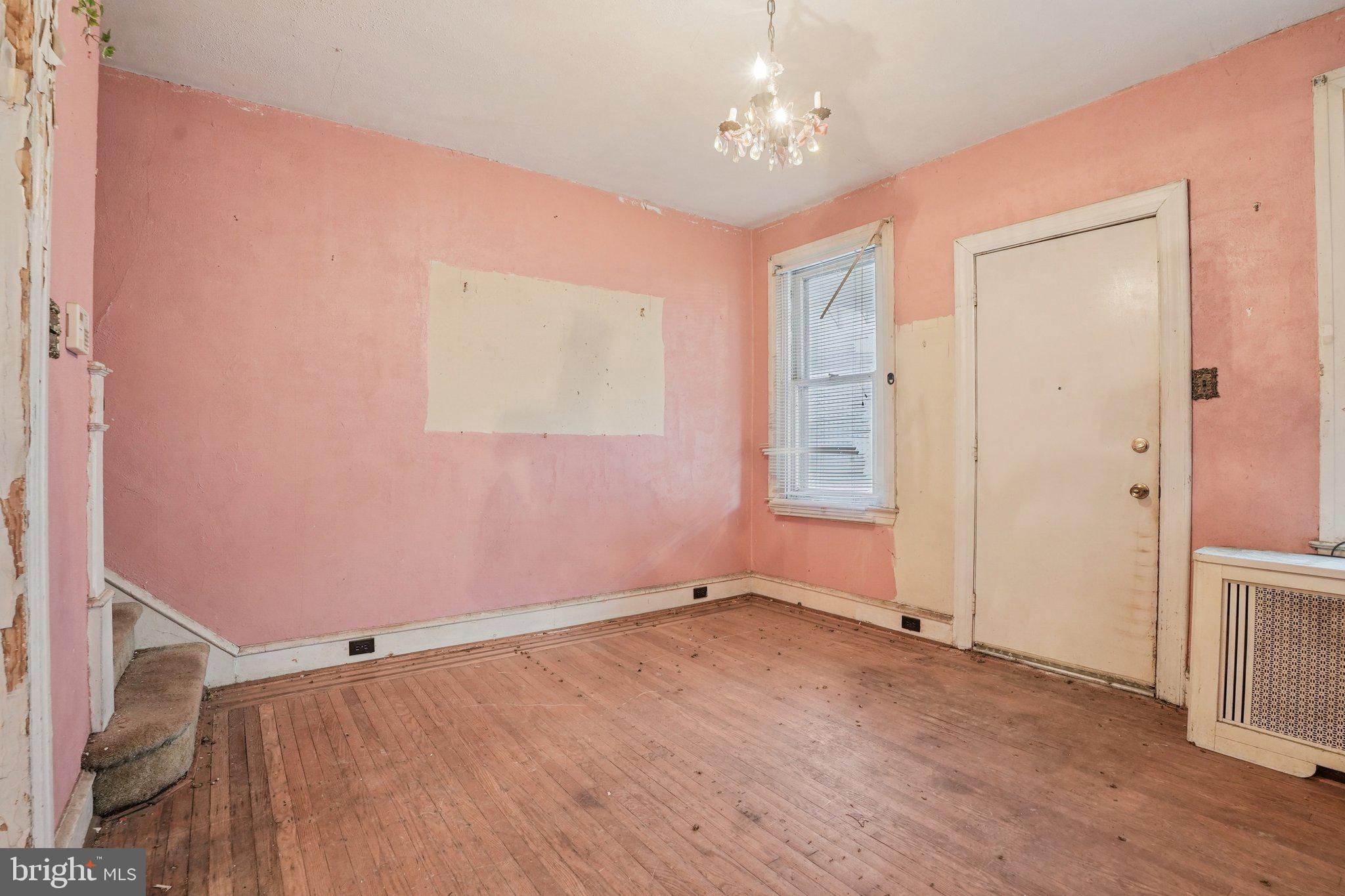 5322 James Street Philadelphia, PA 19137 - Photo 6 of 40 a view of room with hardwood floor and ceiling fan