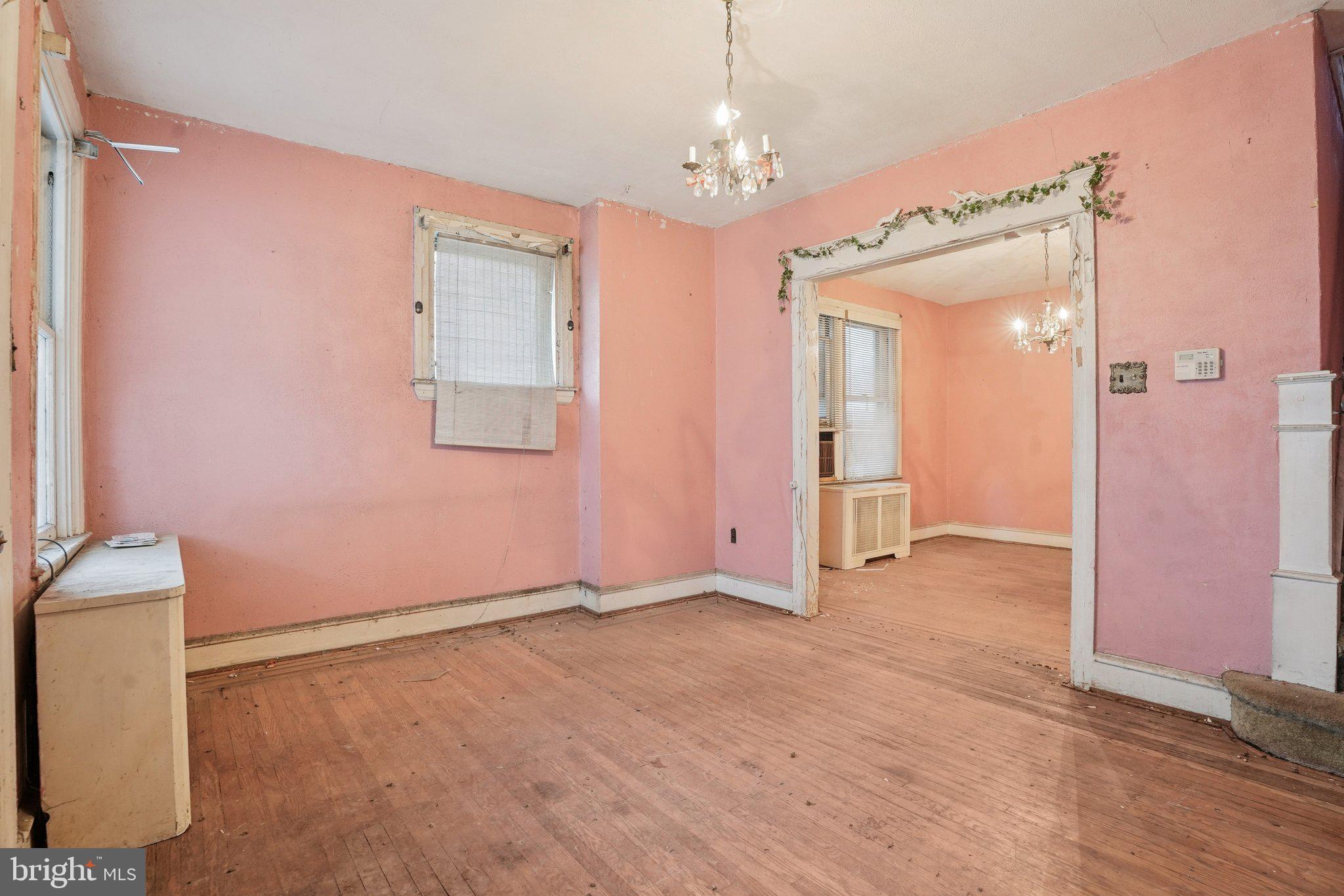 5322 James Street Philadelphia, PA 19137 - Photo 7 of 40 an empty room with chandelier fan and windows