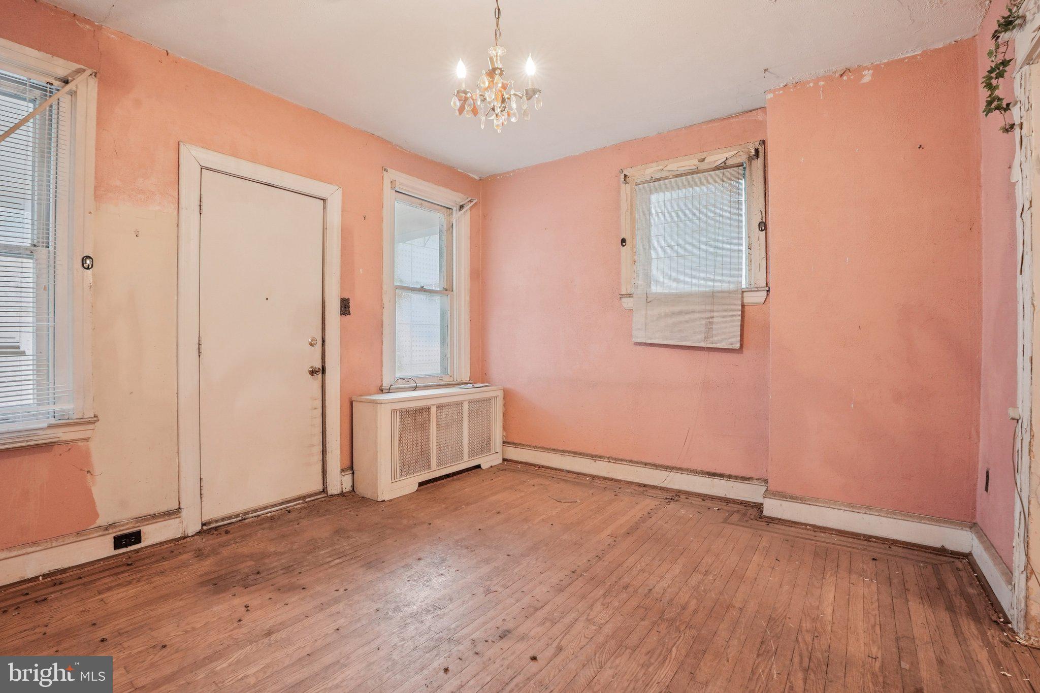 5322 James Street Philadelphia, PA 19137 - Photo 8 of 40 an empty room with wooden floor and windows