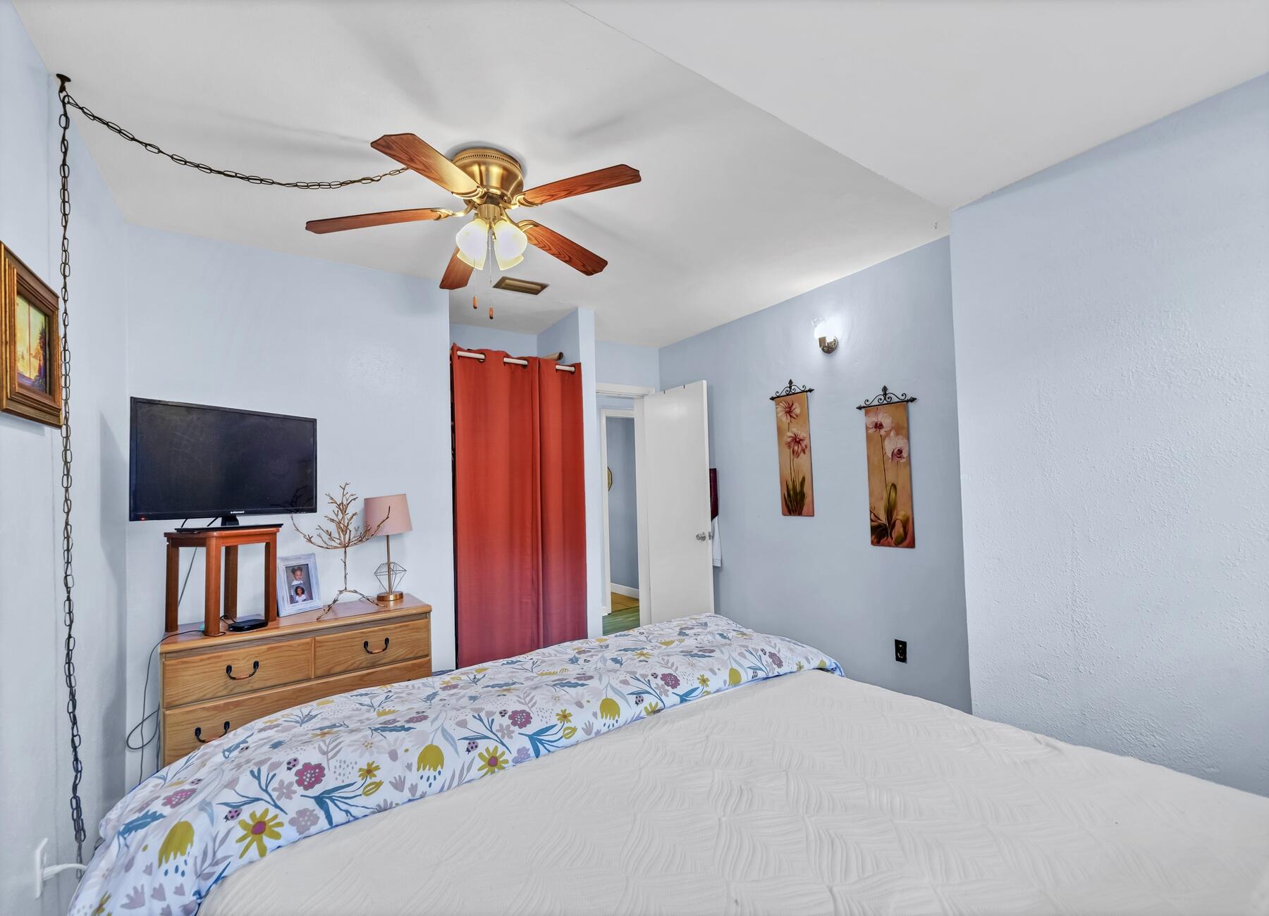43 Ferry Road Northeast Fort Walton Beach, FL 32548 - Photo 12 of 23 a bedroom with a bed and a flat screen tv