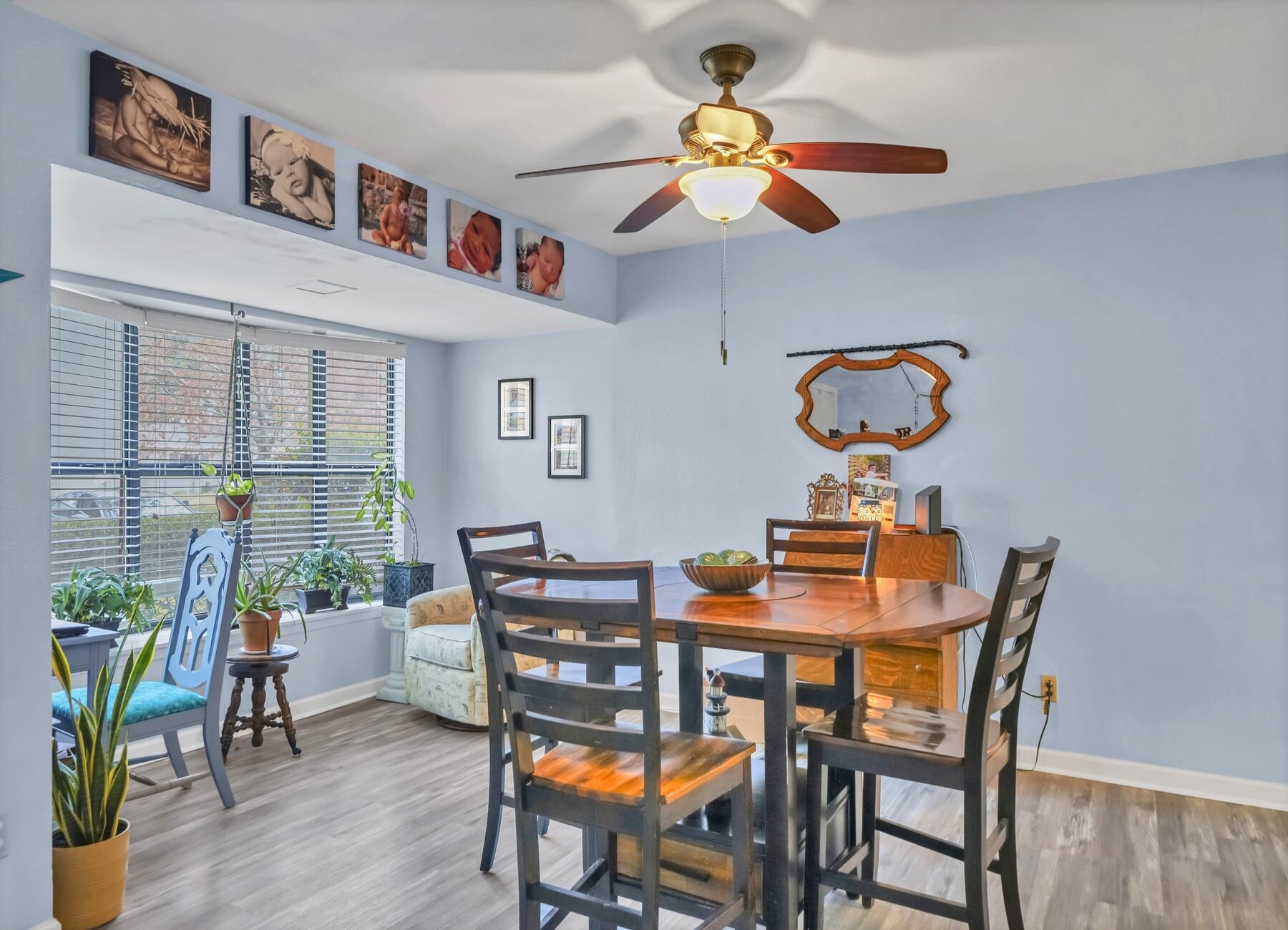 43 Ferry Road Northeast Fort Walton Beach, FL 32548 - Photo 2 of 23 a dining room filled with furniture and wooden floor