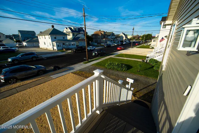 a view of a porch and garden