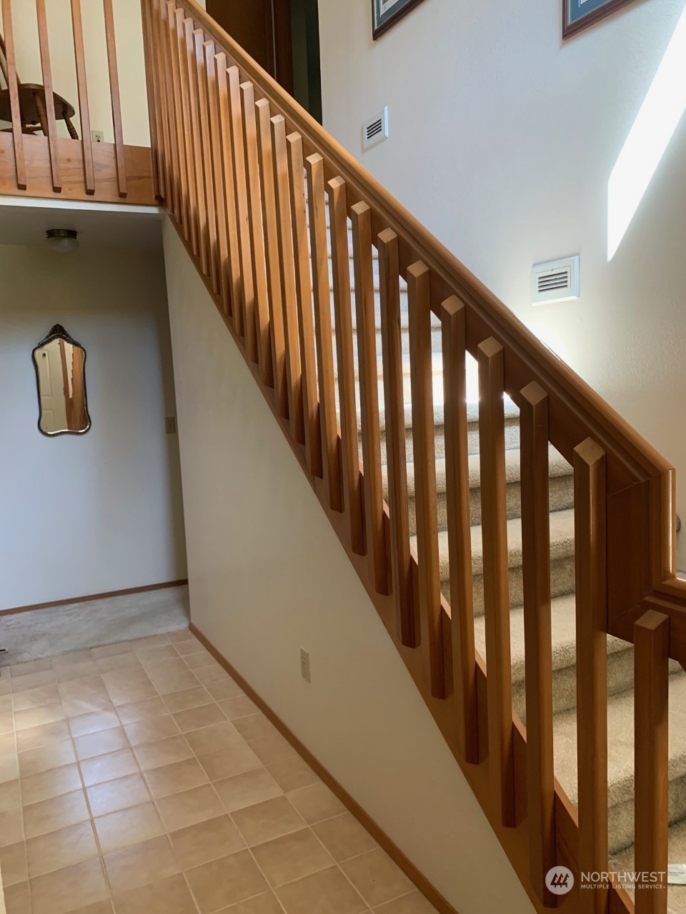 240 East Channel Drive Allyn, WA 98524 - Photo 3 of 33 a view of staircase with rug door