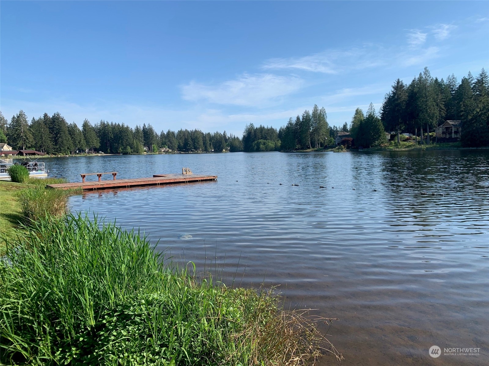 240 East Channel Drive Allyn, WA 98524 - Photo 33 of 33 a view of lake with green space