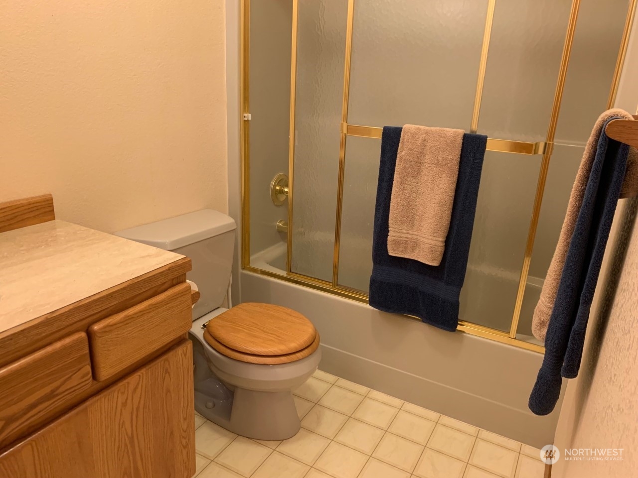 240 East Channel Drive Allyn, WA 98524 - Photo 9 of 33 a bathroom with a sink and a toilet
