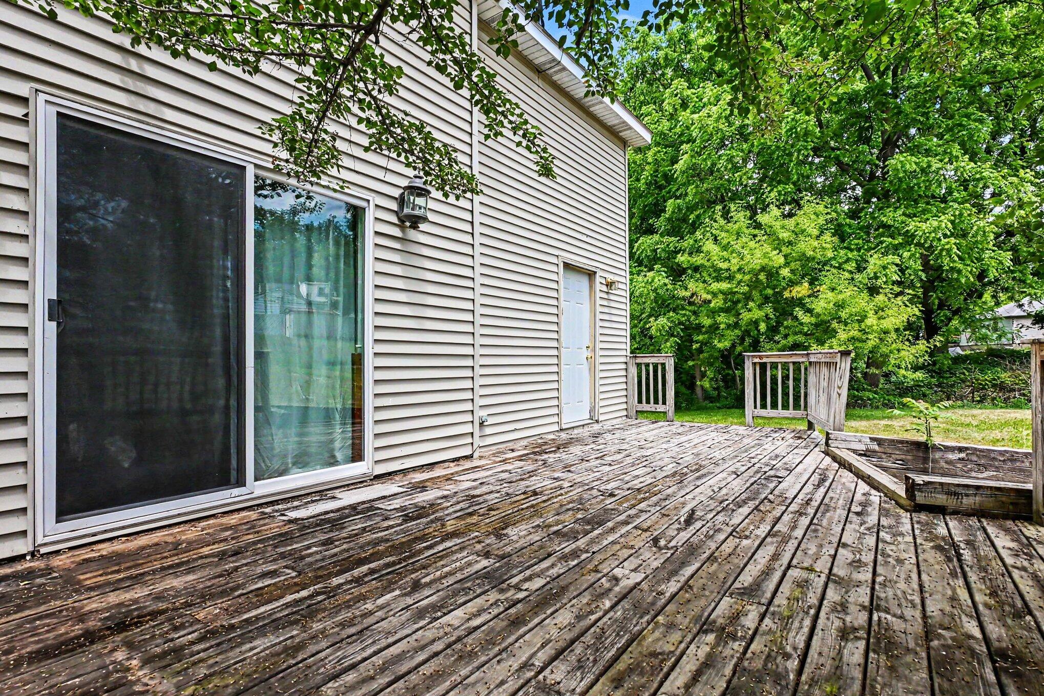 115 McClung Road La Porte, IN 46350 - Photo 20 of 31 a view of backyard with a deck
