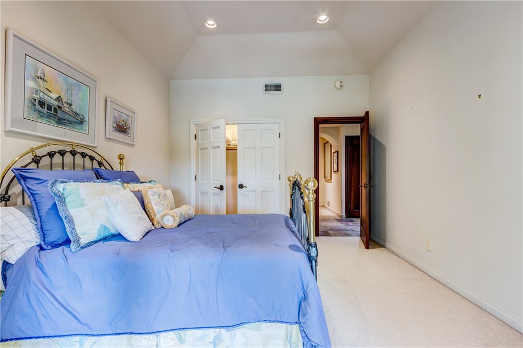 39250 Ortega Highway Fallbrook, CA 92028 - Photo 26 of 59 a bedroom with a bed and a painting on the wall