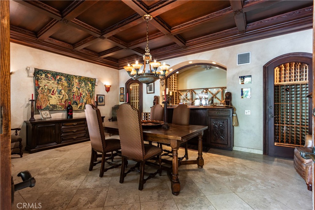 39250 Ortega Highway Fallbrook, CA 92028 - Photo 36 of 59 a view of a dining room with furniture and chandelier