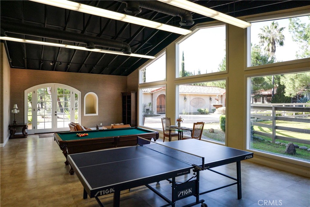 39250 Ortega Highway Fallbrook, CA 92028 - Photo 42 of 59 a living room with table chairs and a large window
