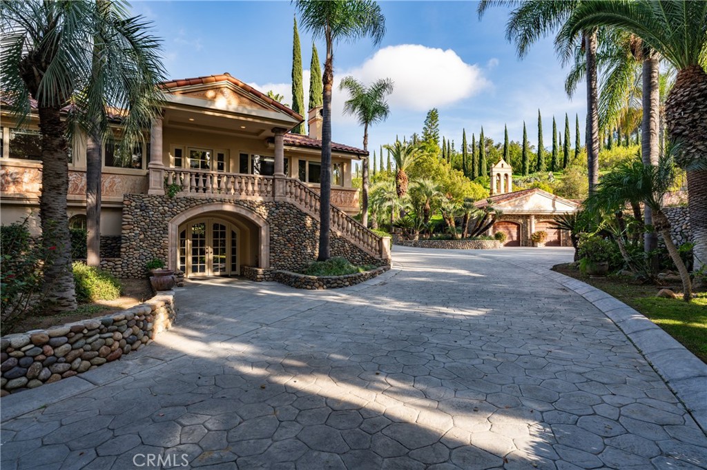 39250 Ortega Highway Fallbrook, CA 92028 - Photo 8 of 59 a front view of a house with garden