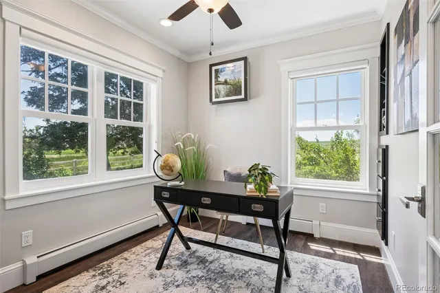 a dining room with furniture window and outside view