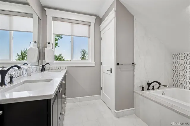 a bathroom with a sink and a bathtub