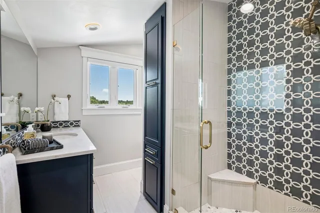 a kitchen with a sink and a refrigerator