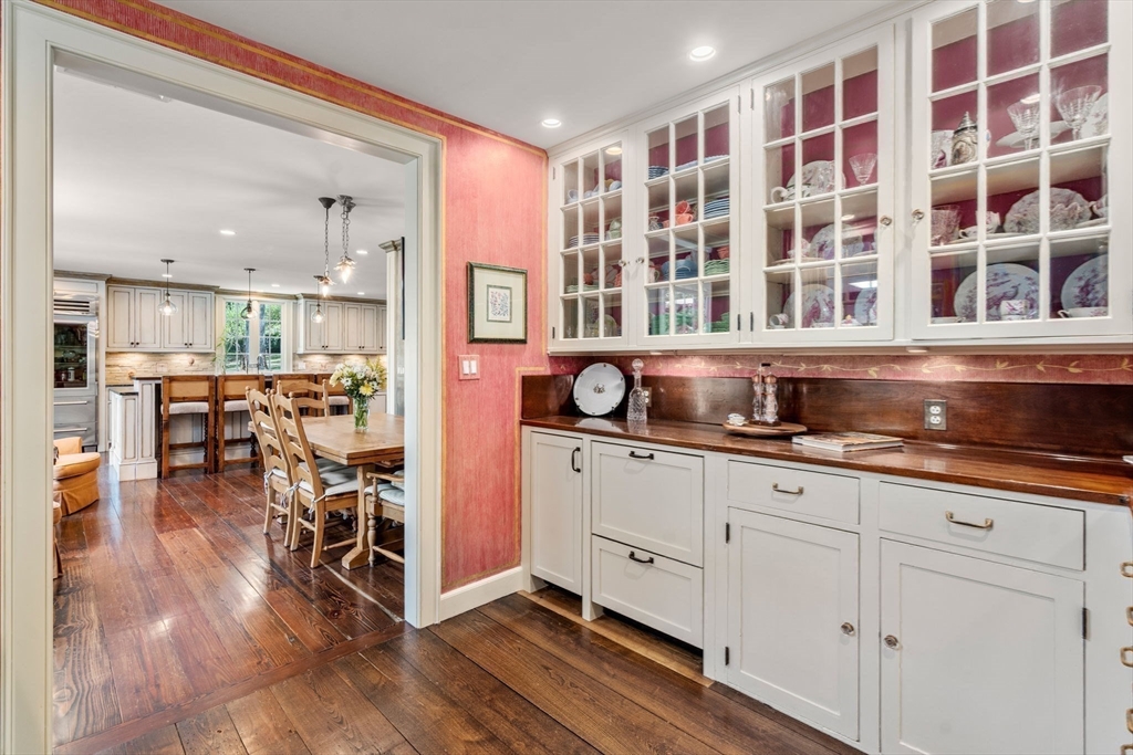 157 Centre Street Dover, MA 02030 - Photo 12 of 42 a open kitchen with stainless steel appliances granite countertop a stove and a cabinets