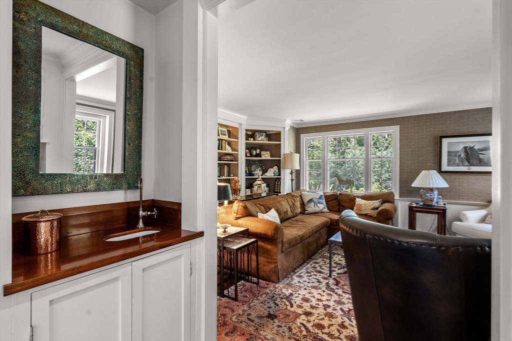 157 Centre Street Dover, MA 02030 - Photo 19 of 42 a living room with furniture and a large window