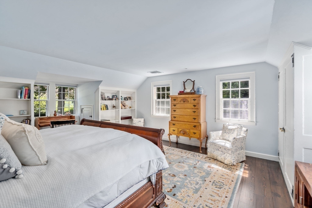 157 Centre Street Dover, MA 02030 - Photo 29 of 42 a bed room with a bed and a chair